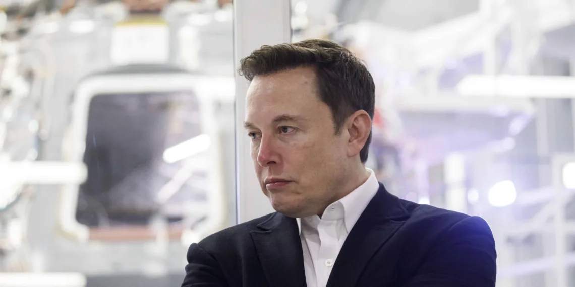 Elon Musk, chief executive officer of Space Exploration Technologies Corp. (SpaceX) and Tesla Inc., listens as Jim Bridenstine, administrator of the U.S. National Aeronautics and Space Administration (NASA), not pictured, speaks during an event at SpaceX headquarters in Hawthorne, California, U.S., on Thursday, Oct. 10, 2019. SpaceXs Elon Musk and NASA Administrator Jim Bridenstine staged a public show of support for one another at the rocket companys headquarters Thursday, weeks after the two traded barbs over the closely held companys delayed efforts to fly astronauts for the first time. Photographer: Patrick T. Fallon/Bloomberg via Getty Images