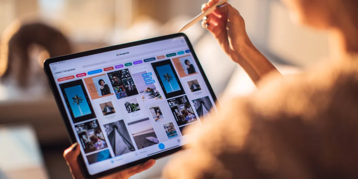 woman holding tablet computer