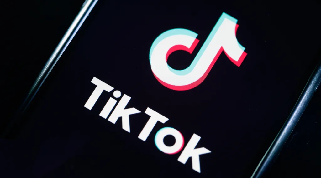 PARIS, FRANCE - MARCH 05: In this photo illustration, the social media application logo, Tik Tok is displayed on the screen of an iPhone on March 05, 2019 in Paris, France. The social network broke the rules for the protection of children's online privacy (COPPA) and was fined $ 5.7 million. The fact TikTok criticized is quite serious in the United States, the platform, which currently has more than 500 million users worldwide, collected data that should not have asked minors. TikTok, also known as Douyin in China, is a media app for creating and sharing short videos. Owned by ByteDance, Tik Tok is a leading  video platform in Asia, United States, and other parts of the world. In 2018, the application gained popularity and became the most downloaded app in the U.S. in October 2018. (Photo by Chesnot/Getty Images)