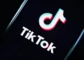 PARIS, FRANCE - MARCH 05: In this photo illustration, the social media application logo, Tik Tok is displayed on the screen of an iPhone on March 05, 2019 in Paris, France. The social network broke the rules for the protection of children's online privacy (COPPA) and was fined $ 5.7 million. The fact TikTok criticized is quite serious in the United States, the platform, which currently has more than 500 million users worldwide, collected data that should not have asked minors. TikTok, also known as Douyin in China, is a media app for creating and sharing short videos. Owned by ByteDance, Tik Tok is a leading  video platform in Asia, United States, and other parts of the world. In 2018, the application gained popularity and became the most downloaded app in the U.S. in October 2018. (Photo by Chesnot/Getty Images)
