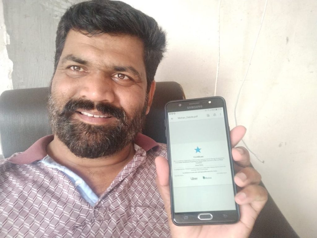 Mohan Dabde who drives on the Uber platform displays his digital certificate from the Uber gender sensitization session delivered in partnership with Manas Foundation Uber gender sensitizes over 100,000 drivers; expands safety initiative to train non-Uber drivers