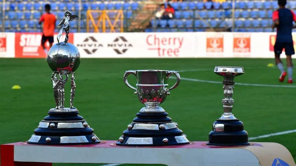 Durand Cup Trophies via Indian Super League Durand Cup 2023 - Everything you need to know about Matches, Teams, Schedules, Venues, and More