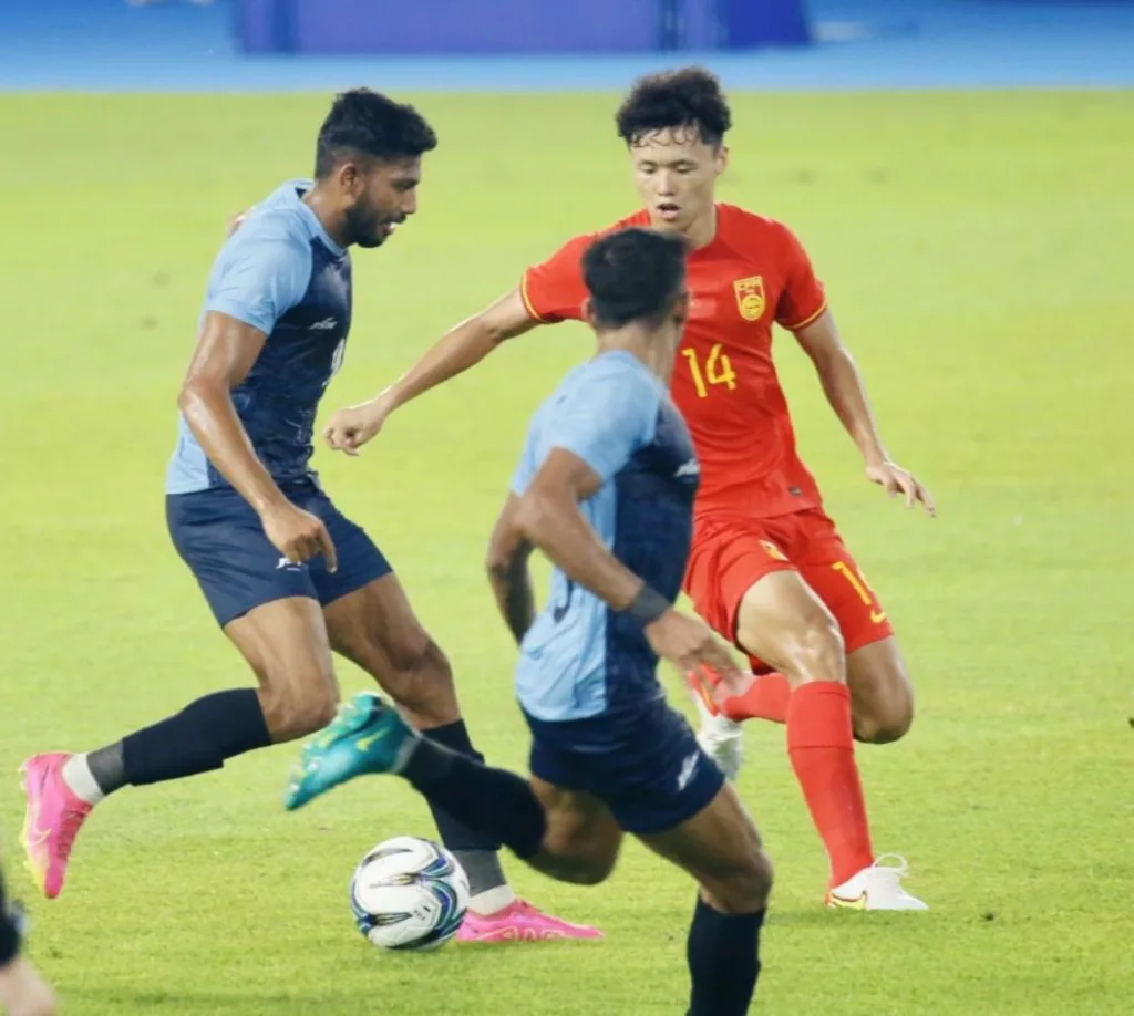 Indian Football Team against China Image via Twitter Indian Football Team goes down 3 places in recent FIFA Rankings: What is the way forward for Sunil Chhetri and co?