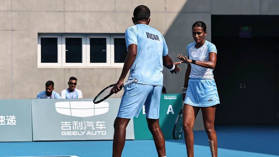 Rohan Bopanna and Rutuja Bhosale Image via Olympics Asian Games 2023: Historic Gold for India in Mixed Doubles Tennis