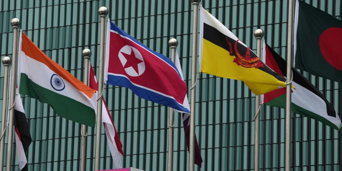 Flags of participating countries, among them North Korea, India, and Brunei, are hoisted at the Athletes Village at the 19th Asian Games in Hangzhou, China, Thursday, Sept. 21, 2023. (AP Photo/Ng Han Guan)