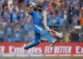 Cricket - ICC Cricket World Cup 2023 - Semi-Final - India v New Zealand - Wankhede Stadium, Mumbai, India - November 15, 2023 India's Virat Kohli celebrates after reaching his 50th century, breaking Sachin Tendulkar's record of most number of ODI centuries REUTERS/Adnan Abidi