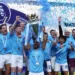 Soccer Football - Premier League - Manchester City v Chelsea - Etihad Stadium, Manchester, Britain - May 21, 2023 Manchester City's Ilkay Gundogan lifts the trophy as he celebrates with teammates after winning the Premier League Action Images via Reuters/Lee Smith