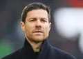 AUGSBURG, GERMANY - JANUARY 13: Xabi Alonso, Head Coach of Bayer Leverkusen, looks on prior to the Bundesliga match between FC Augsburg and Bayer 04 Leverkusen at WWK-Arena on January 13, 2024 in Augsburg, Germany. (Photo by Sebastian Widmann/Getty Images)