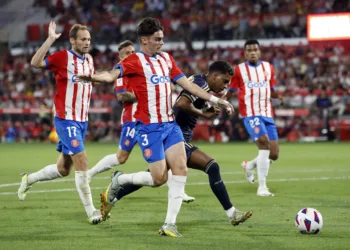 Soccer Football - LaLiga - Girona v Real Madrid - Estadi Montilivi, Girona, Spain - September 30, 2023 Real Madrid's Rodrygo in action with Girona's Miguel Gutierrez REUTERS/Albert Gea