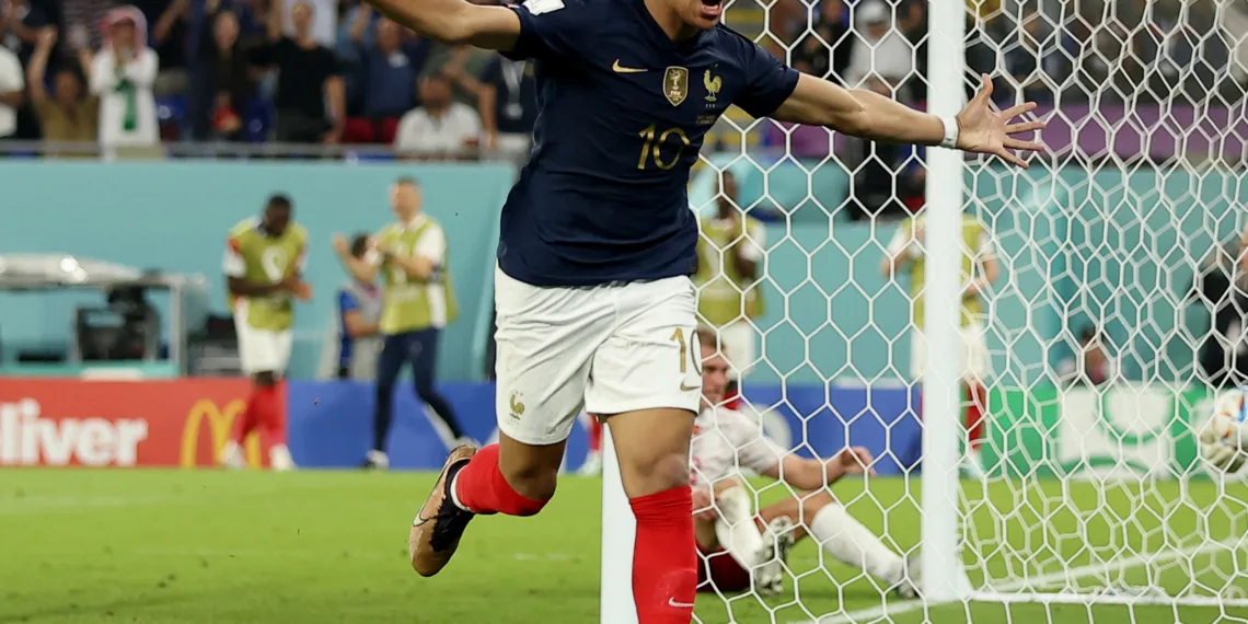 Soccer Football - FIFA World Cup Qatar 2022 - Group D - France v Denmark - Stadium 974, Doha, Qatar - November 26, 2022 France's Kylian Mbappe celebrates scoring their second goal REUTERS/Kim Hong-Ji