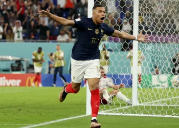 Soccer Football - FIFA World Cup Qatar 2022 - Group D - France v Denmark - Stadium 974, Doha, Qatar - November 26, 2022 France's Kylian Mbappe celebrates scoring their second goal REUTERS/Kim Hong-Ji