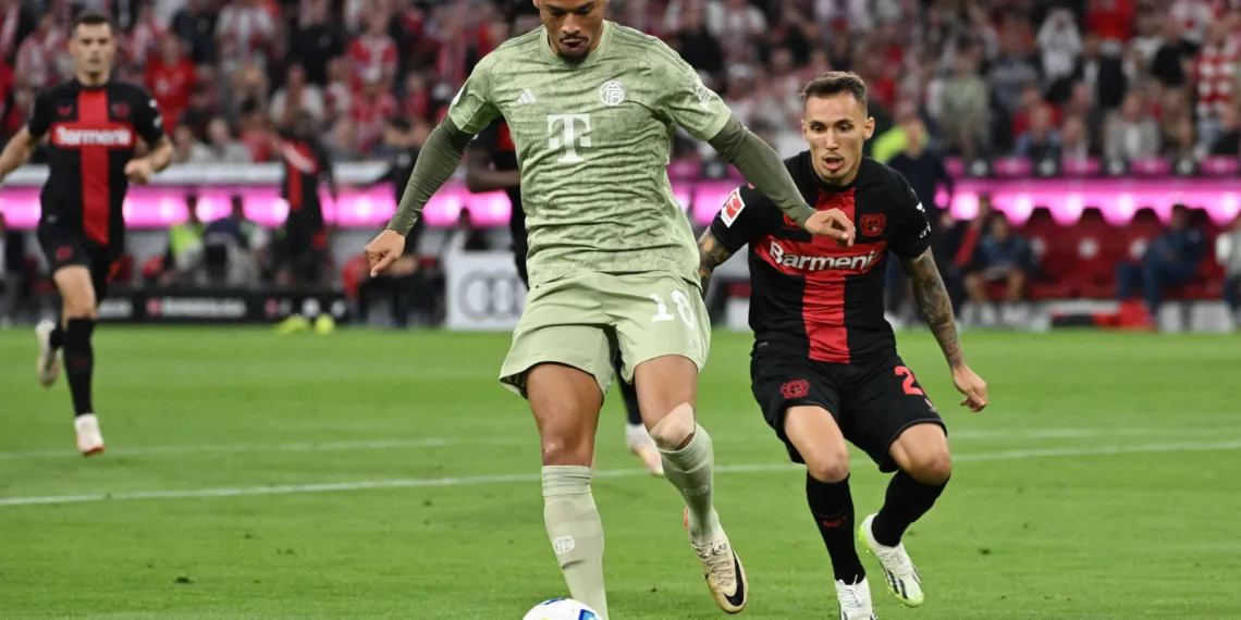 Soccer Football - Bundesliga - Bayern Munich v Bayer Leverkusen - Allianz Arena, Munich, Germany - September 15, 2023 Bayern Munich's Leroy Sane in action with Bayer Leverkusen's Alejandro Grimaldo REUTERS/Angelika Warmuth