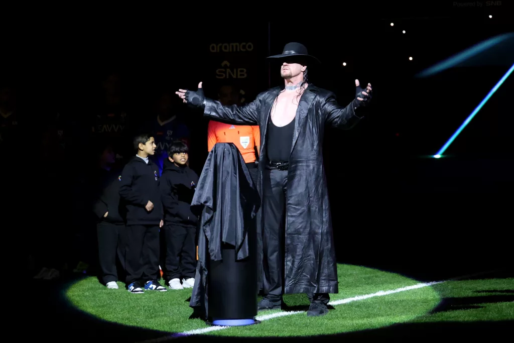 WWEs The Undertaker presented the Riyadh Season Trophy to the victor of the Al Hilal versus Al Nassr match Image Credits X Twitter REVEALED: Why Was The Undertaker at Al-Nassr vs Al-Hilal in Riyadh Season Cup Final?