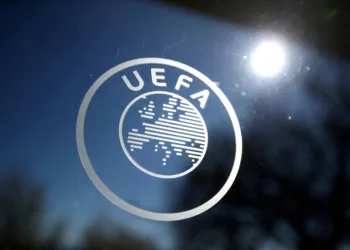 FILE PHOTO: Soccer Football - Europa League - Round of 16 draw - Nyon, Switzerland - February 28, 2020. General view of the UEFA logo at UEFA Headquarters before the draw. REUTERS/Denis Balibouse