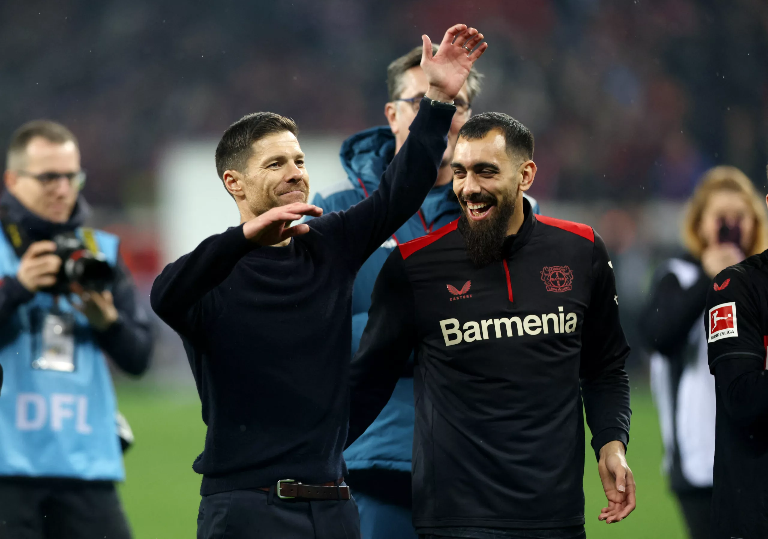 Soccer Football - Bundesliga - Bayer Leverkusen v Bayern Munich - BayArena, Leverkusen, Germany - February 10, 2024 Bayer Leverkusen coach Xabi Alonso celebrates with Borja Iglesias after the match REUTERS/Thilo Schmuelgen/ File Photo