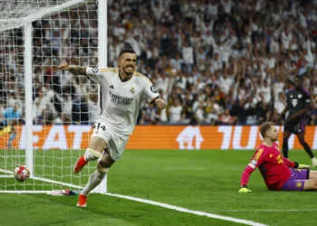 Soccer Football - Champions League - Semi Final - Second Leg - Real Madrid v Bayern Munich - Santiago Bernabeu, Madrid, Spain - May 8, 2024  Real Madrid's Joselu celebrates scoring their first goal as Bayern Munich's Manuel Neuer looks dejected REUTERS/Susana Vera