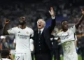 Soccer Football - Champions League - Semi Final - Second Leg - Real Madrid v Bayern Munich - Santiago Bernabeu, Madrid, Spain - May 8, 2024  Real Madrid's Antonio Rudiger, coach Carlo Ancelotti and Vinicius Junior celebrate after the match REUTERS/Susana Vera