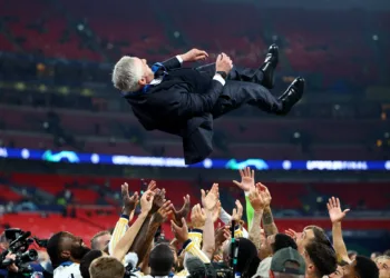 Soccer Football - Champions League - Final - Borussia Dortmund v Real Madrid - Wembley Stadium, London, Britain - June 1, 2024 Real Madrid players throw coach Carlo Ancelotti in the air as they celebrate after winning the Champions League final REUTERS/Hannah Mckay