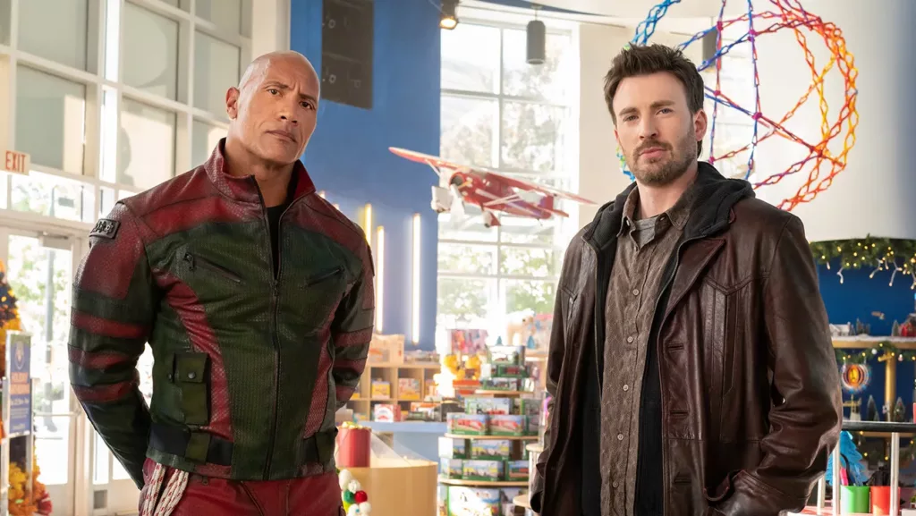 Dwayne Johnson Chris Evans red one publicity H 2024 Dwayne Johnson and Chris Evans Join Forces To Save Christmas in Exciting 'Red One'