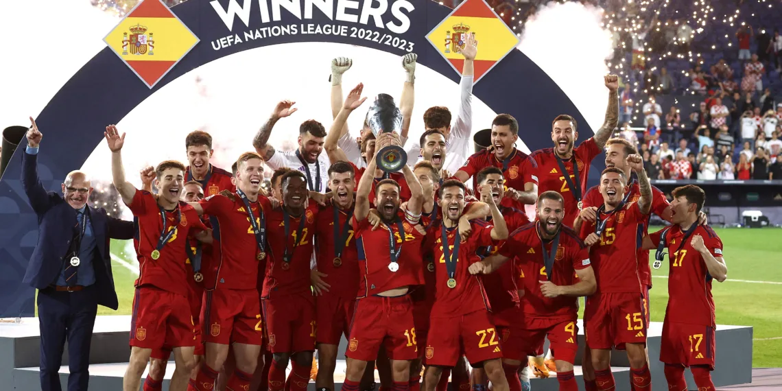 Soccer Football - UEFA Nations League Final - Croatia v Spain - Feyenoord Stadium, Rotterdam, Netherlands - June 18, 2023 Spain's Jordi Alba lifts the trophy with teammates after winning the UEFA Nations League final REUTERS/Yves Herman