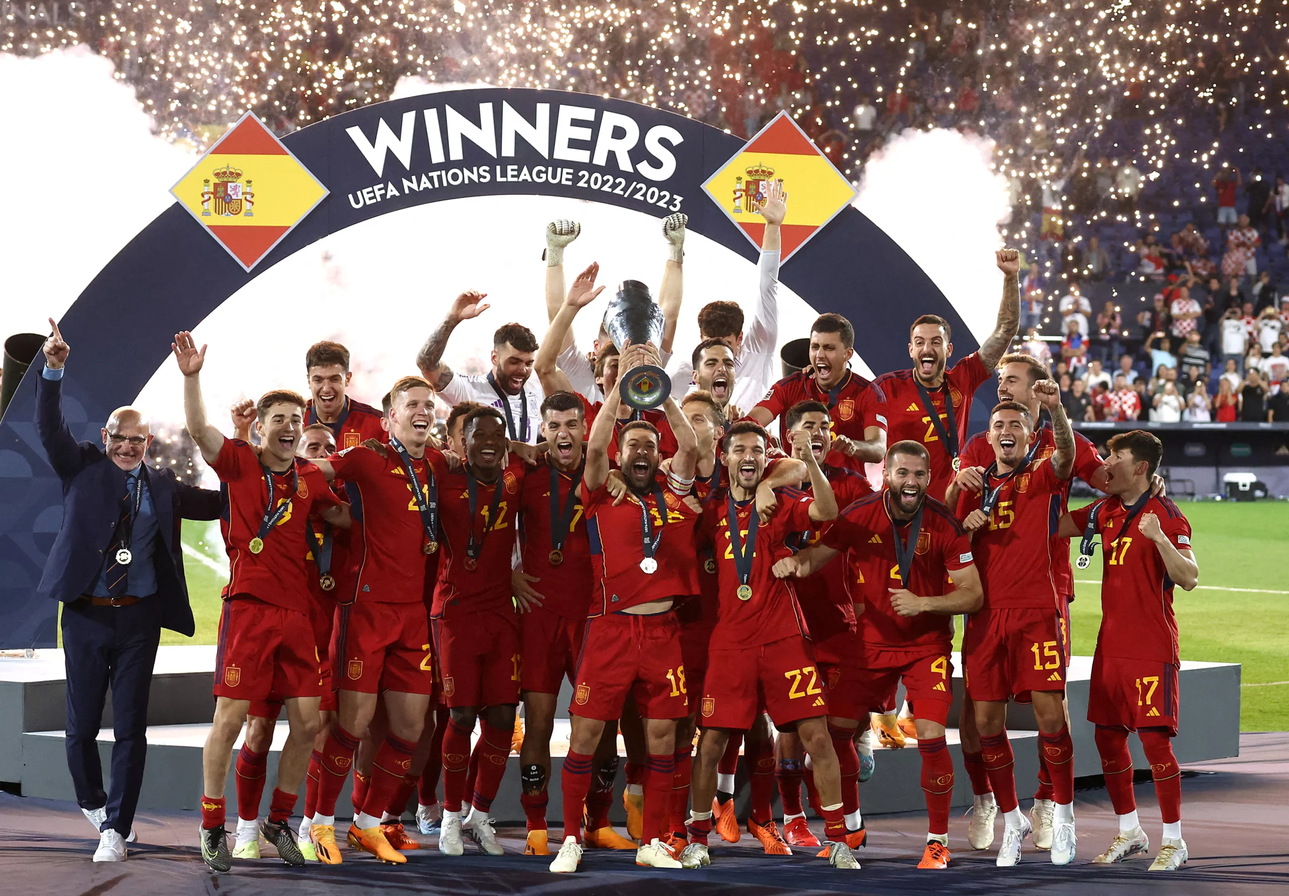 Soccer Football - UEFA Nations League Final - Croatia v Spain - Feyenoord Stadium, Rotterdam, Netherlands - June 18, 2023 Spain's Jordi Alba lifts the trophy with teammates after winning the UEFA Nations League final REUTERS/Yves Herman