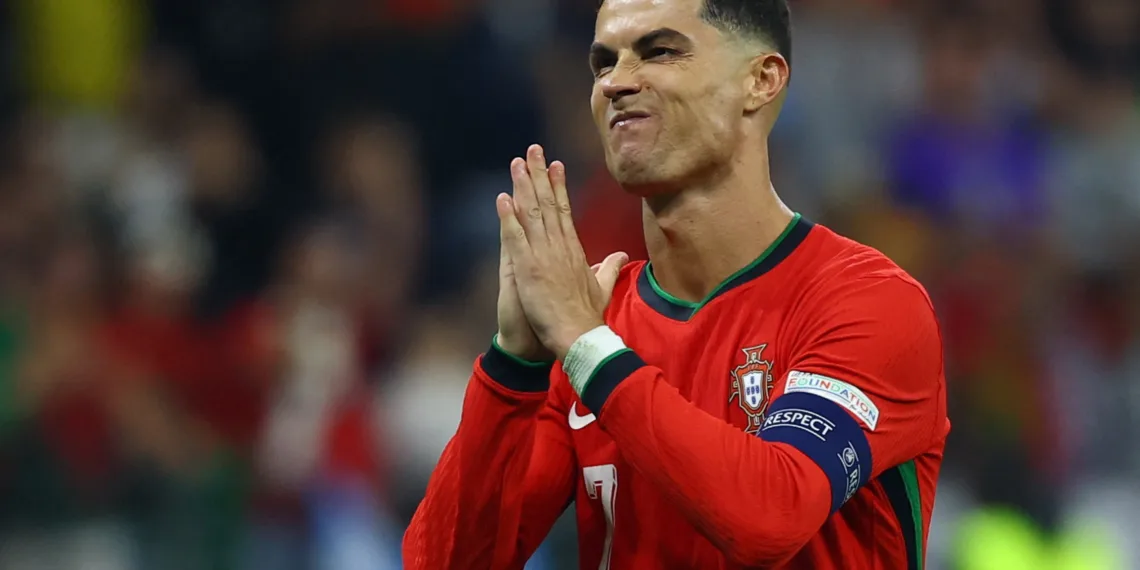 Soccer Football - Euro 2024 - Round of 16 - Portugal v Slovenia - Frankfurt Arena, Frankfurt, Germany - July 1, 2024 Portugal's Cristiano Ronaldo celebrates after he scores a penalty during the shoot-out REUTERS/Kai Pfaffenbach