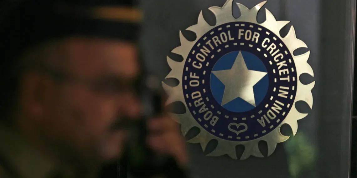 A policeman walks past a logo of the Board of Control for Cricket in India (BCCI) during a governing council meeting of the Indian Premier League (IPL) at BCCI headquarters in Mumbai April 26, 2010. Indian Premier League chief Lalit Modi has been suspended, officials said on Monday, after graft accusations in cricket's richest event ensnared top politicians and Bollywood stars and strained the ruling coalition.  REUTERS/Arko Datta (INDIA - Tags: SPORT CRICKET)