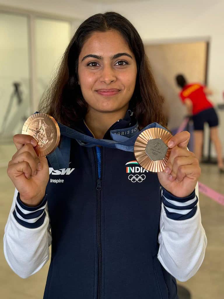 GTvAiZHW8AA fIS Manu Bhaker's Paris Olympics Triumph Promises Her Rich Rewards: Guaranteed Rs 1 Crore After Twin Medals and Looks Good for Few More