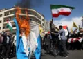 FILE PHOTO: Iranians burn an Israeli flag during a rally marking Quds Day and the funeral of members of the Islamic Revolutionary Guard Corps who were killed in a suspected Israeli airstrike on the Iranian embassy complex in the Syrian capital Damascus, in Tehran, Iran, April 5, 2024. Majid Asgaripour/WANA (West Asia News Agency) via REUTERS/File Photo