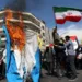 FILE PHOTO: Iranians burn an Israeli flag during a rally marking Quds Day and the funeral of members of the Islamic Revolutionary Guard Corps who were killed in a suspected Israeli airstrike on the Iranian embassy complex in the Syrian capital Damascus, in Tehran, Iran, April 5, 2024. Majid Asgaripour/WANA (West Asia News Agency) via REUTERS/File Photo