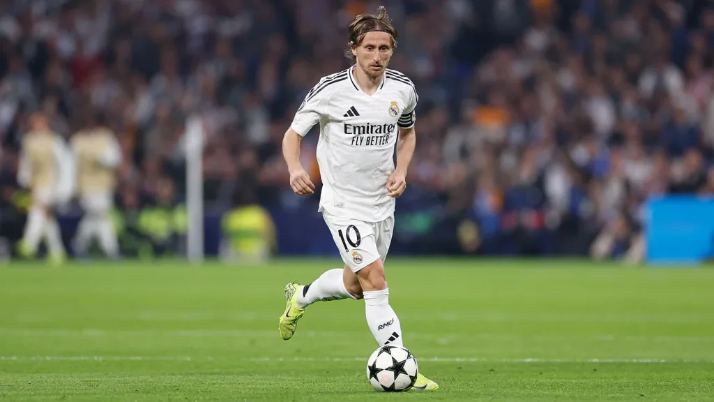 Modric made his 550th appearance as a Real Madrid player in the teams clash with Milan at the Santiago Bernabeu Real Madrid’s Aurélien Tchouaméni Sidelined for a Month in Latest Injury Blow