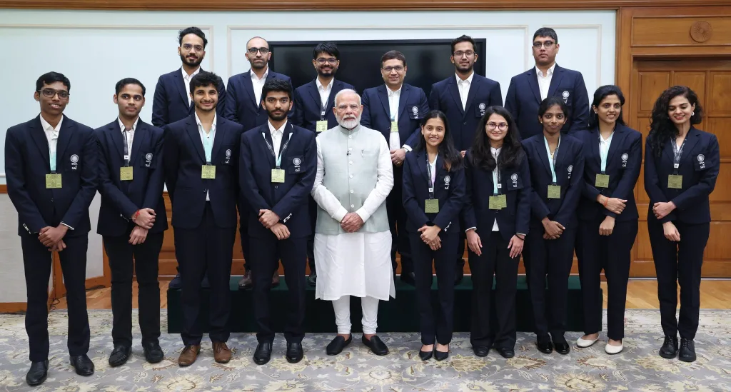 Indian Chess Team with PM Narednra Modi India's Chess Revolution in 2024: Gukesh’s Reign, Olympiad Triumphs, and Praggnanandhaa vs Carlsen