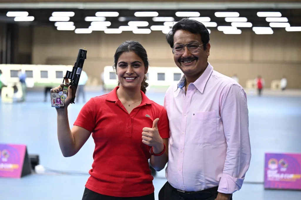 Manu Bhaker with her Coach Jaspal Rana Manu Bhaker Left Out of Khel Ratna Nomination: A Controversy Brews Over Missing Application