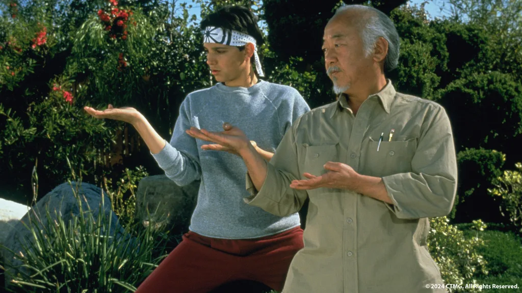 Ralph Macchio and Pat Morita in The Karate Kid 1984 Karate Kid Legends Trailer: Ralph Macchio and Jackie Chan Team Up to Revive the Iconic Franchise