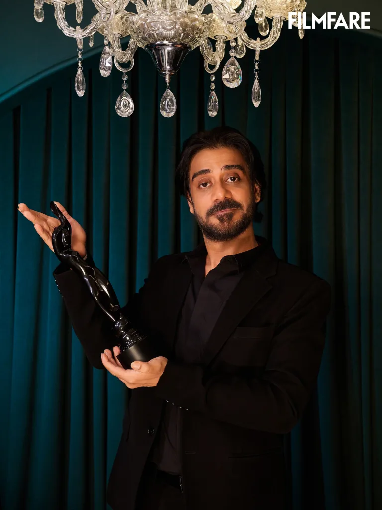 Saurabh Sachdeva poses with the Black Lady after winning the Filmfare Award for Best Actor Short Film Male for First Time Filmfare OTT Awards 2024: Full List of Winners As Diljit Dosanjh wins Best Actor for Chamkila in A Night of Glitz and Triumph