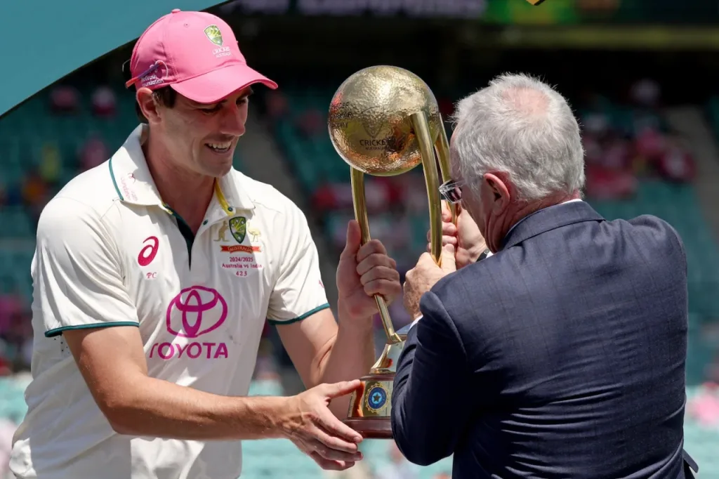 Pat Cummins collects the BGT Trophy from Allan Border Australia vs India 5th Test: Day 3 Match Report As Australia Reclaim The Border-Gavaskar Trophy After 10 Years, Securing A WTC Final Clash With South Africa