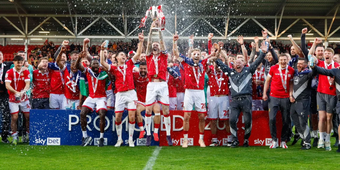 Wrexham’s Historic Promotion: Hollywood Owners Ryan Reynolds and Rob McElhenney Lead the Welsh Club to Championship