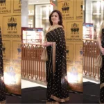 Regal Radiance: Nita Ambani Black and Gold Saree Masterpiece Unveiled