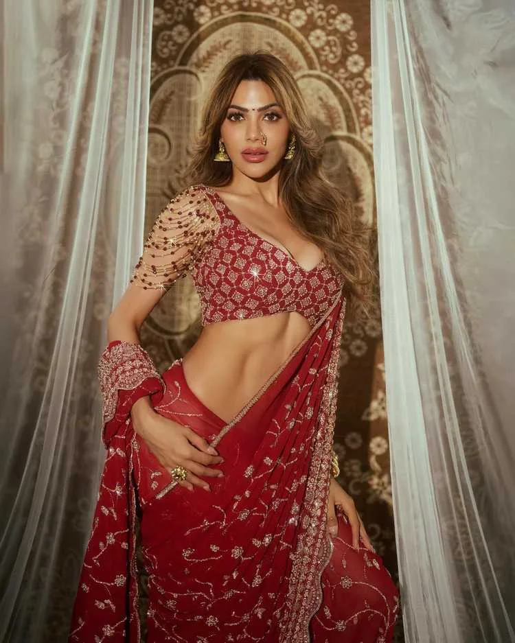 Nikki Tamboli: Rising Star of Indian Entertainment - From Bigg Boss to Celebrity MasterChef 2025 15 Image