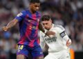 Marcus Rashford left winger of Barcelona and England and Federico Valverde central midfield of Real Madrid and Uruguay compete for the ball during the La Liga EA Sports match between Real Madrid CF and FC Barcelona at Estadio Santiago Bernabeu on October 26, 2025 in Madrid, Spain. (Photo by Jose Breton/Pics Action/NurPhoto via Getty Images)