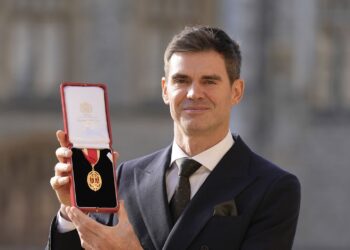 WINDSOR, ENGLAND - OCTOBER 28: Sir James Anderson, England Cricketer, poses after he was made a Knight Bachelor by Princess Anne, Princess Royal at an investiture ceremony at Windsor Castle on October 28, 2025 in Windsor, England. (Photo by Andrew Matthews - Pool/Getty Images)