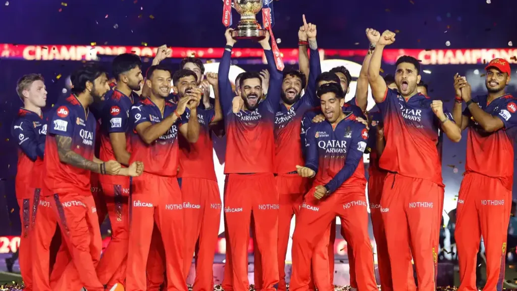 Adani Stake in RCB: What's Really Happening With the IPL Deal? 3 RCB Adani 2 Adani Stake in RCB: What's Really Happening With the IPL Deal?