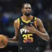 FILE - Phoenix Suns forward Kevin Durant gestures during the second half of an NBA basketball game on March 9, 2025, in Dallas. (AP Photo/Julio Cortez, File)