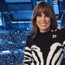 Holly Campbell's Bold Zebra-Striped Chanel Sweater Steals Show at Lions MNF Victory 2 image 1764 Holly Campbell's Bold Zebra-Striped Chanel Sweater Steals Show at Lions MNF Victory