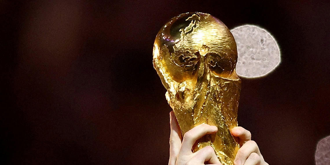 FILE PHOTO: Soccer Football - FIFA World Cup Qatar 2022 - Final - Argentina v France - Lusail Stadium, Lusail, Qatar - December 18, 2022  General view of Argentina's Lionel Messi lifting the trophy as he celebrates winning the World Cup REUTERS/Hannah Mckay/File Photo