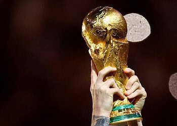 FILE PHOTO: Soccer Football - FIFA World Cup Qatar 2022 - Final - Argentina v France - Lusail Stadium, Lusail, Qatar - December 18, 2022  General view of Argentina's Lionel Messi lifting the trophy as he celebrates winning the World Cup REUTERS/Hannah Mckay/File Photo