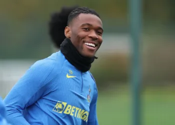 ENFIELD, ENGLAND - NOVEMBER 03: Destiny Udogie reacts during a training session of Tottenham Hotspur ahead of the UEFA Champions League match between Tottenham Hotspur and FC Copenhagen at Tottenham Hotspur Training Centre on November 03, 2025 in Enfield, England. (Photo by Eddie Keogh/Getty Images)