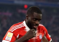 MUNICH, GERMANY - NOVEMBER 22: Dayot Upamecano of Bayern Munich celebrates scoring his team's third goal during the Bundesliga match between FC Bayern M?nchen and SC Freiburg at Allianz Arena on November 22, 2025 in Munich, Germany. (Photo by Alexander Hassenstein/Getty Images)