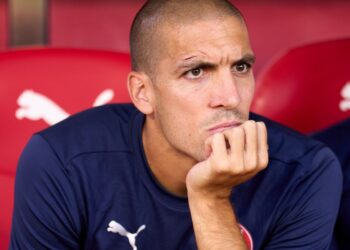GIRONA, SPAIN - AUGUST 29: Oriol Romeu of Girona FC looks on from the bench prior to the LaLiga EA Sports match between Girona FC and CA Osasuna at Montilivi Stadium on August 29, 2024 in Girona, Spain. (Photo by Alex Caparros/Getty Images)