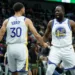 Nov 16, 2025; New Orleans, Louisiana, USA; Golden State Warriors forward Draymond Green (23) celebrates with guard Stephen Curry (30) during the first half against the New Orleans Pelicans at Smoothie King Center. Mandatory Credit: Matthew Hinton-Imagn Images